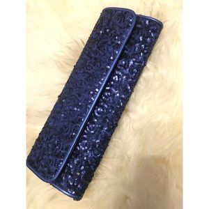 Sequin clutch